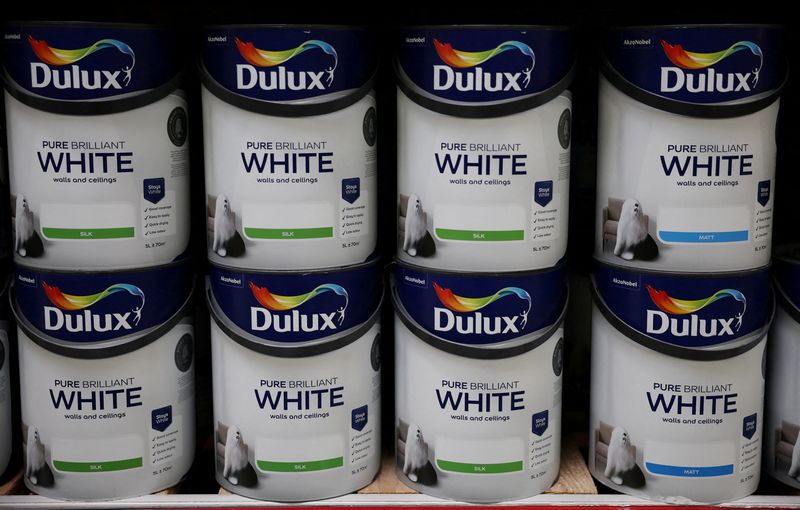Cans of Dulux paint, an AkzoNobel brand, are seen on the shelf of a DIY retail store in Manchester, Britain, June 14, 2024. REUTERS/Phil Noble