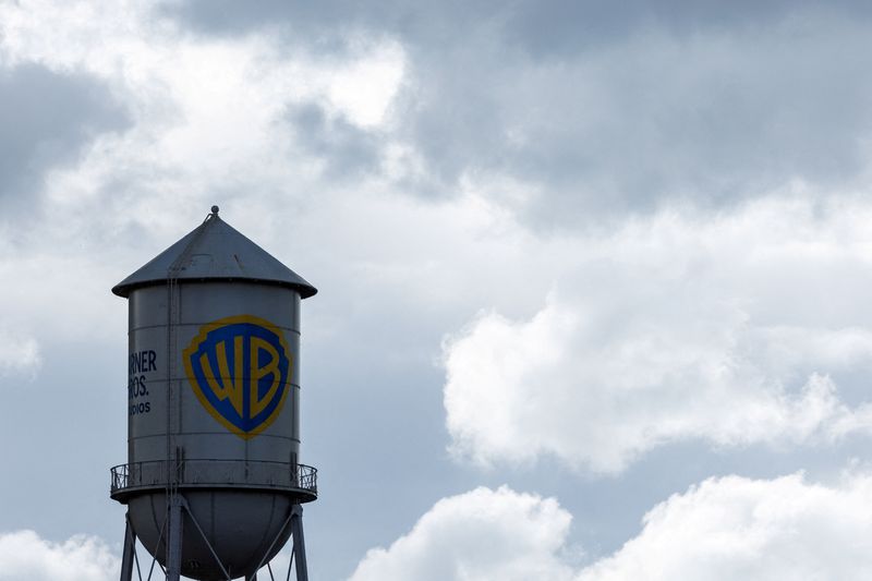 The Warner Bros. studios water tower stands under a stormy sky in Burbank, California, U.S. November 18, 2025.  REUTERS/Mike Blake