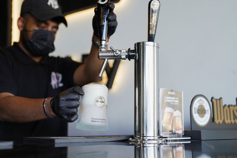 An employee pours a draft non-alcoholic beer at the A12 cafe in Riyadh, Saudi Arabia, November 24, 2025. REUTERS/Staff