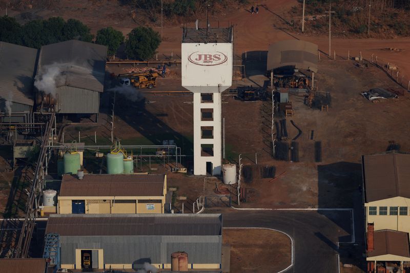 FILE PHOTO: The logo of JBS S.A, the world's largest beef producer, is pictured at a plant of JBS in Santana do Araguaia, Para state, Brazil September 11, 2025. REUTERS/Amanda Perobelli/File Photo