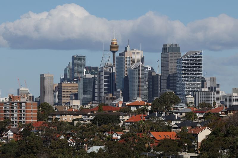 Residential properties in view of the Sydney Central Business District (CBD) skyline in Sydney, Australia, July 10, 2025. REUTERS/Hollie Adams