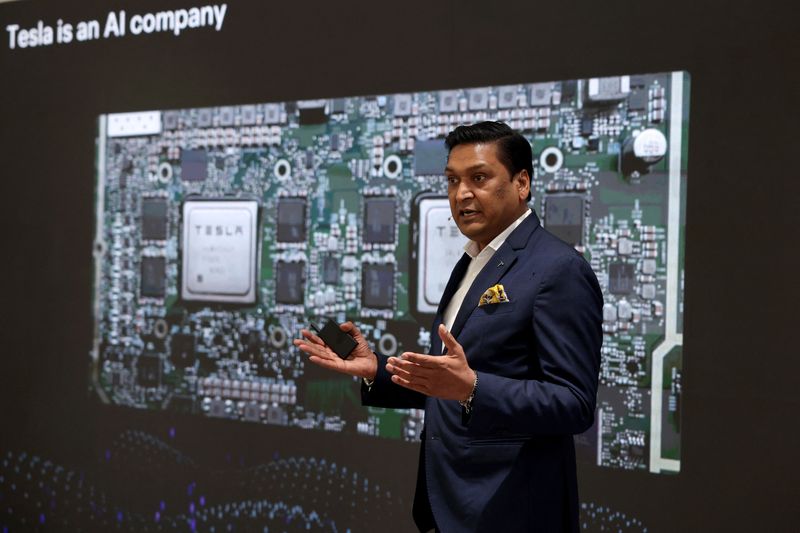 Sharad Agarwal, Tesla's India General Manager, addresses an audience at the newly launched Tesla centre in Gurugram, India, November 26, 2025. REUTERS/Bhawika Chhabra