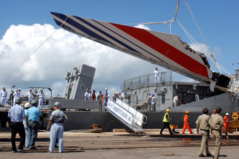 FILE PHOTO: Debris of the missing Air France flight 447, recovered from the Atlantic Ocean, arrives at Recife's port June 14, 2009. An Air France Airbus 330 crashed into the sea on June 1 en route from Brazil to Paris, killing all 228 aboard. REUTERS/JC Imagem/Alexandre Severo/File Photo