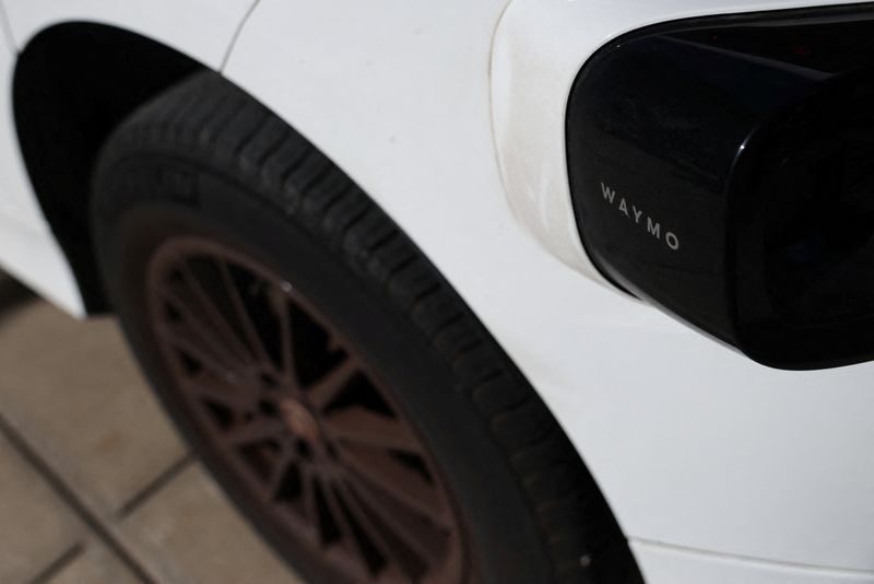 A Waymo driverless vehicle at Bronx Community College in the Bronx Borough of New York City , U.S., October 16, 2025. REUTERS/Shannon Stapleton