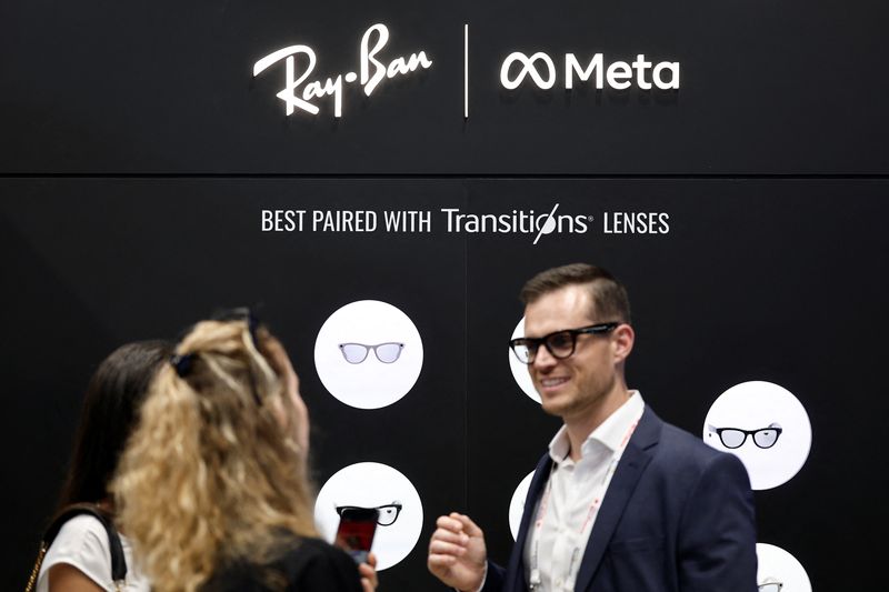 Logos of Ray-Ban and Meta are seen on the EssilorLuxottica stand during the Viva Technology conference dedicated to innovation and startups at Porte de Versailles exhibition center in Paris, France, June 12, 2025. REUTERS/Benoit Tessier