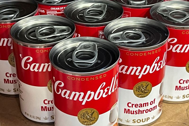Cans of Campbell's cream of mushroom soup line a supermarket shelf in Bellingham, Washington, U.S. April 25, 2024.  REUTERS/Chris Helgren