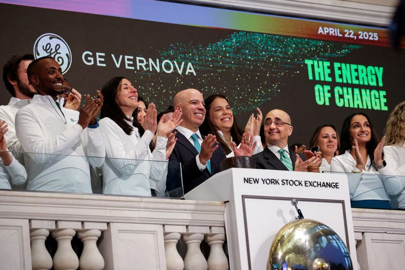 FILE PHOTO: GE Vernova executive rings the opening bell at the New York Stock Exchange (NYSE) in New York City, U.S., April 22, 2025.  REUTERS/Brendan McDermid/File Photo