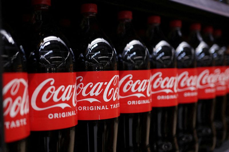 FILE PHOTO: Bottles of Coca Cola are displayed on a shelf in a supermarket October 29, 2024. REUTERS/Dado Ruvic/Illustration/File Photo