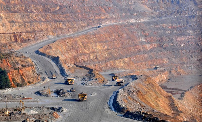 Trucks are seen at a copper mine of Jiangxi Copper in Dexing, Jiangxi province, China December 16, 2015. Picture taken December 16, 2015. REUTERS/Stringer