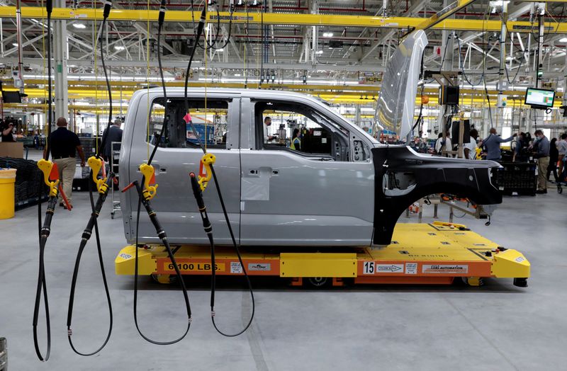 FILE PHOTO: The cab to a Ford all-electric F-150 Lightning truck prototype is seen on an automated guided vehicle (AGV) at the Rouge Electric Vehicle Center in Dearborn, Michigan, U.S. September 16, 2021.   REUTERS/Rebecca Cook/File Photo