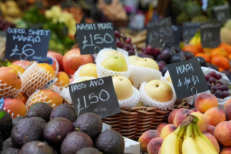 Prices of food are displayed at the Borough Market as the UK inflation rates fall by less than expected in London, Britain May 22, 2024. REUTERS/Maja Smiejkowska
