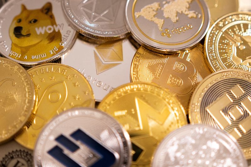 FILE PHOTO: A representations of cryptocurrencies in this illustration created on January 24, 2022. REUTERS/Dado Ruvic/Illustration/File Photo