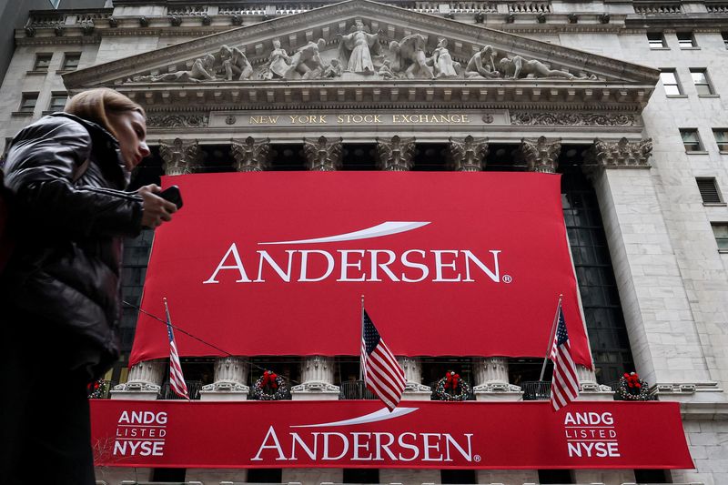A banner for Andersen Group Inc. hangs on the front of the New York Stock Exchange (NYSE) in honor of the company's IPO in New York City, U.S., December 17, 2025.  REUTERS/Brendan McDermid