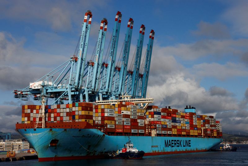 FILE PHOTO: Containers are seen on the Maersk Triple-E giant container ship Majestic Maersk, one of the world's largest container ships, next to cranes at the APM Terminals in the port of Algeciras, Spain, January 20, 2023. REUTERS/Jon Nazca/File Photo