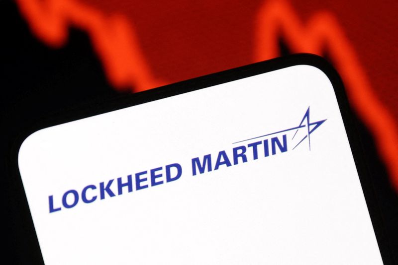Lockheed Martin logo and a decreasing stock graph are seen in this illustration taken July 26, 2025. REUTERS/Dado Ruvic/Illustration