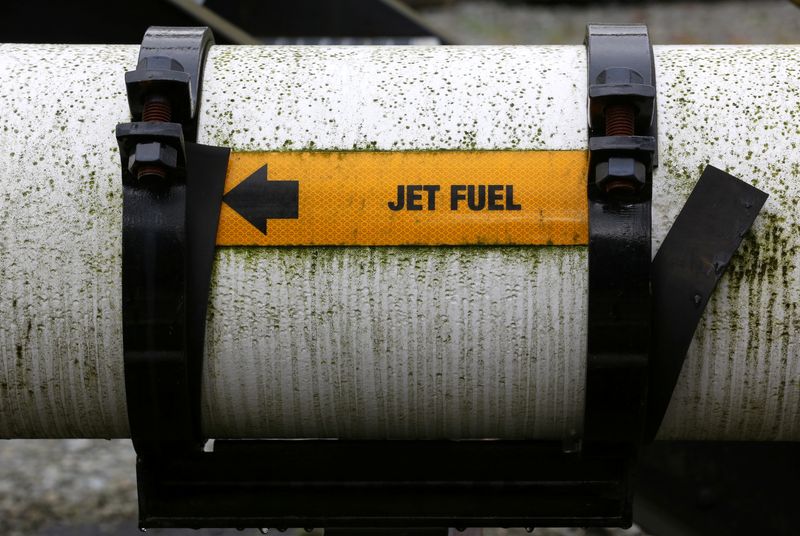 FILE PHOTO: A pipe transporting jet fuel offloaded from barges in seen at Burnaby, British Columbia, Canada November 18, 2016. REUTERS/Chris Helgren