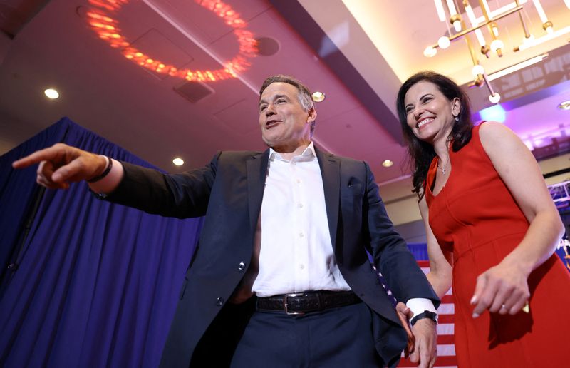 FILE PHOTO: Dina Powell McCormick and her husband Republican Senate candidate react during the 2024 U.S. Election, in downtown Pittsburgh, Pennsylvania, U.S., November 6, 2024. REUTERS/Quinn Glabicki/ File Photo