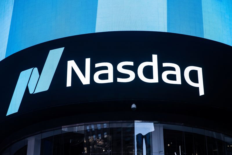 The Nasdaq logo is displayed at the Nasdaq Market site in Times Square in New York City, U.S., December 3, 2021. REUTERS/Jeenah Moon
