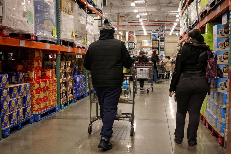 People shop at a Costco store in the Staten Island borough of New York City, U.S., January 16, 2026.  REUTERS/Brendan McDermid