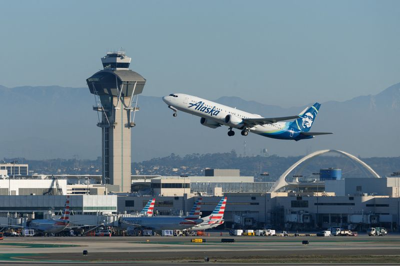 An Alaska Airlines commercial airliner takes-off from Los Angeles International Airport in Los Angeles, California, U.S., November 6, 2025. REUTERS/Mike Blake