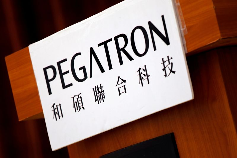 The logo of Pegatron, which assembles electronics from Apple Inc’s iPhones, is seen during an annual general meeting in Taipei, Taiwan June 20, 2017. REUTERS/Tyrone Siu