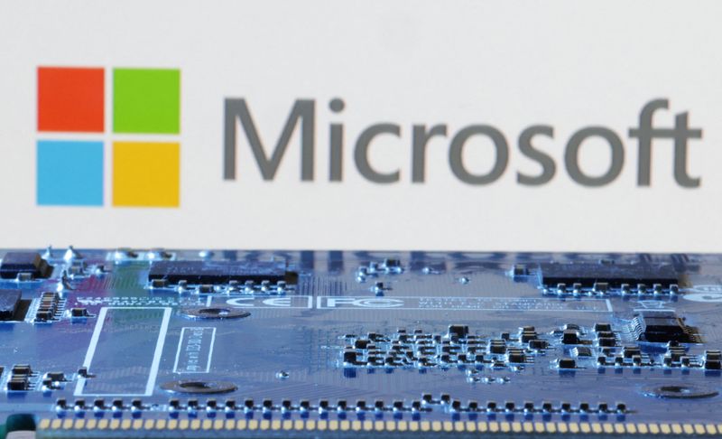 Microsoft logo is seen near computer motherboard in this illustration taken January 8, 2024. REUTERS/Dado Ruvic/Illustration
