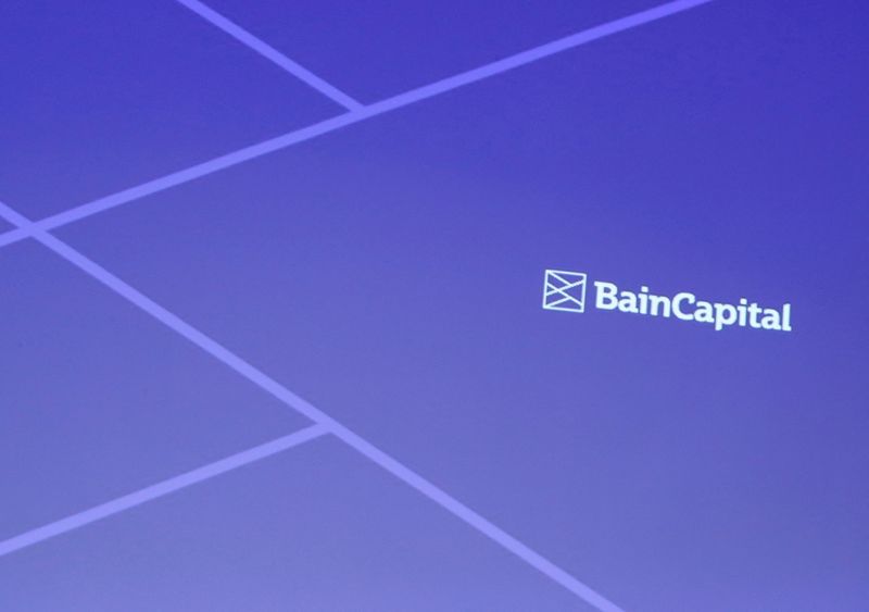 FILE PHOTO: Logo of Bain Capital is screened at a news conference in Tokyo, Japan September 28, 2017. REUTERS/Kim Kyung-Hoon//File Photo