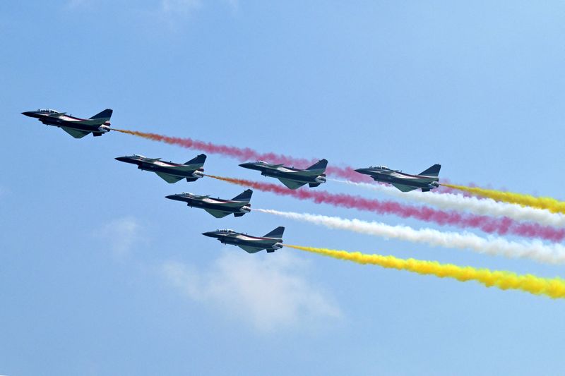 The People’s Liberation Army Air Force Bayi Aerobatic Team performs during an aerial flying display ahead of the Singapore Airshow at Changi Exhibition Centre in Singapore February 1, 2026. REUTERS/Caroline Chia