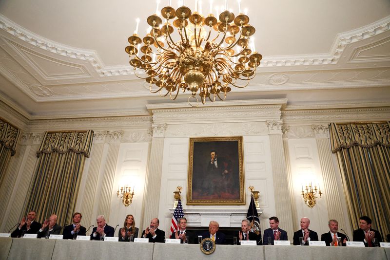 FILE PHOTO: U.S. President Donald Trump  attends the White House Crypto Summit at the White House in Washington, D.C., U.S.,  March 7, 2025. REUTERS/Evelyn Hockstein/File Photo