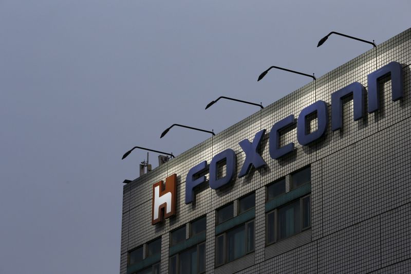 The logo of Foxconn, the trading name of Hon Hai Precision Industry, is seen on top of the company's headquarters in New Taipei City, Taiwan March 29, 2016. REUTERS/Tyrone Siu
