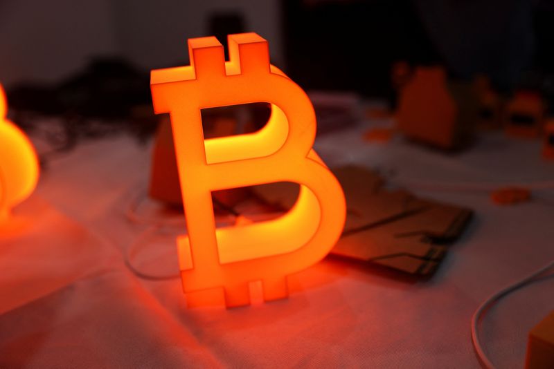 A bitcoin light is displayed at the "Bitcoin Treasuries Unconference" cryptocurrency event, in New York City, New York, U.S., September 17, 2025.  REUTERS/Joy Malone