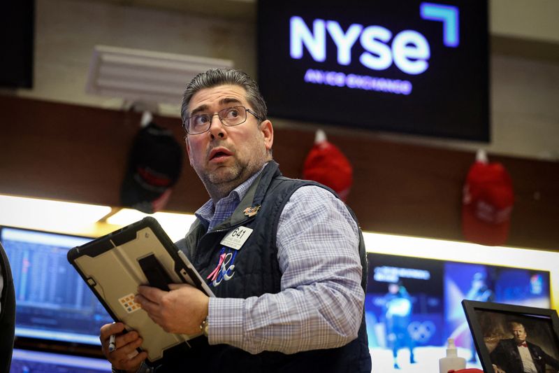 A trader works on the floor at the New York Stock Exchange (NYSE) in New York City, U.S., February 5, 2026.  REUTERS/Brendan McDermid