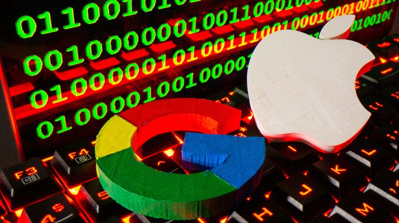 3D printed logos of Apple and Google are pictured on a keyboard in front of binary code in this illustration taken September 24, 2021. REUTERS/Dado Ruvic/Illustration