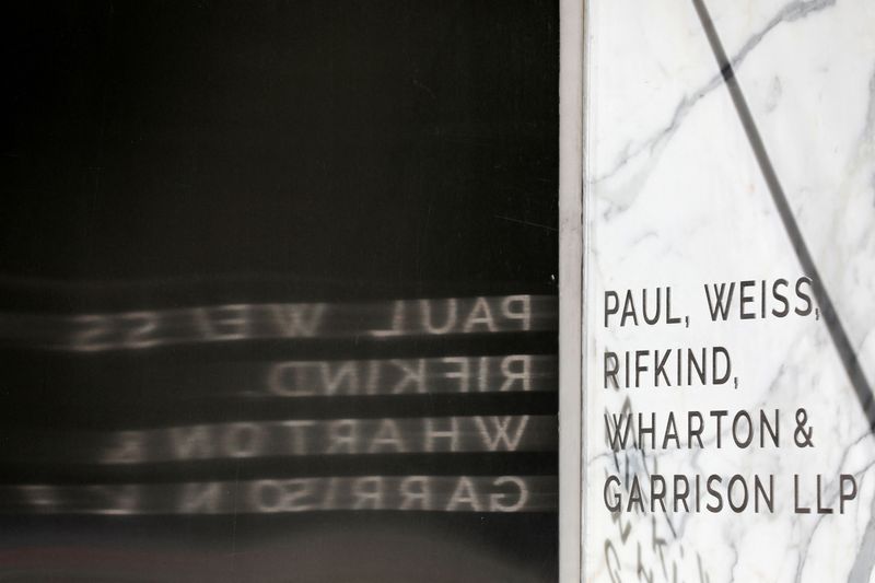FILE PHOTO: Signage is seen outside of the law firm Paul, Weiss, Rifkind, Wharton & Garrison LLP in Washington, D.C., U.S., August 30, 2020. REUTERS/Andrew Kelly/File Photo