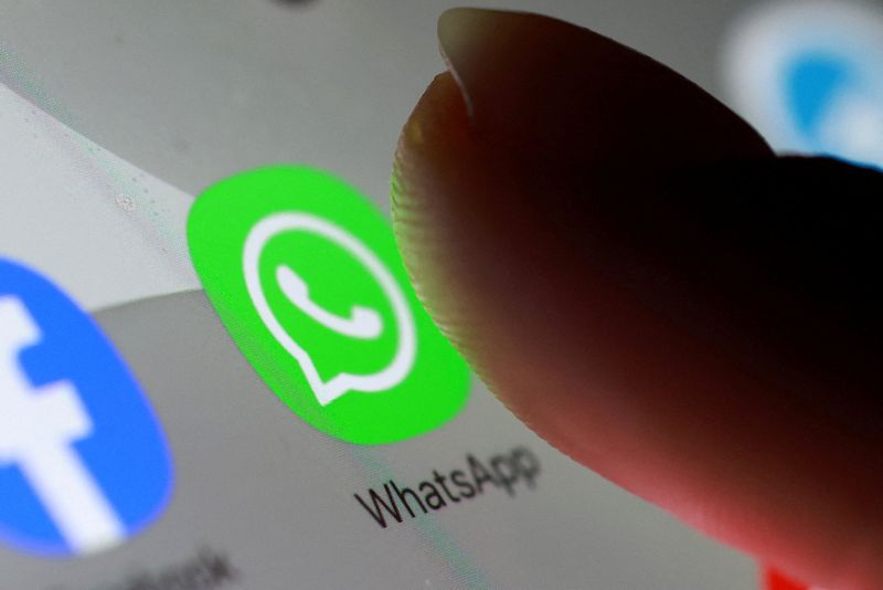 The WhatsApp app icon is seen on a smartphone in this illustration taken October 27, 2025. REUTERS/Dado Ruvic/Illustration