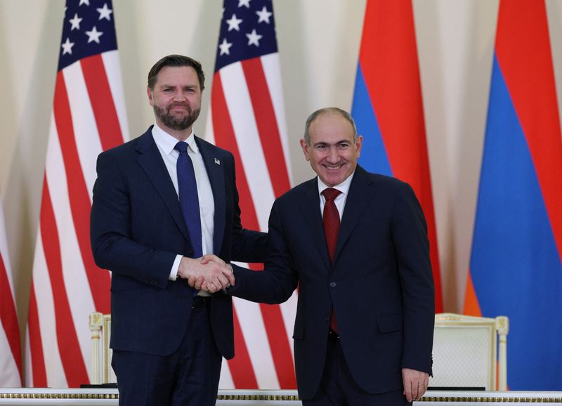 U.S. Vice President JD Vance and Armenia's Prime Minister Nikol Pashinyan shake hands, as they attend a joint press conference, in Yerevan, Armenia, February 9, 2026. Vahram Baghdasaryan/Photolure via REUTERS