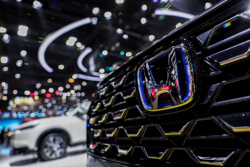 The Honda logo is displayed, at the 46th Bangkok International Motor Show in Bangkok, Thailand, March 24, 2025. REUTERS/Chalinee Thirasupa