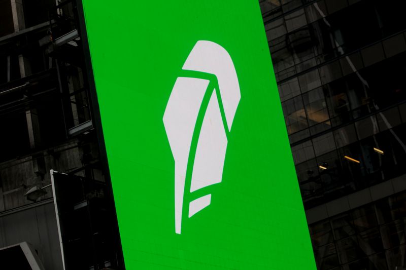 The logo for Robinhood Markets, Inc., is displayed on a screen during the company’s IPO at the Nasdaq Market site in Times Square in New York City, U.S., July 29, 2021.  REUTERS/Brendan McDermid