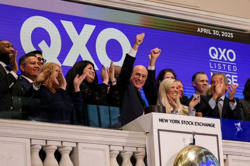 FILE PHOTO: Brad Jacobs, Chairman and CEO of QXO, rings the opening bell at the New York Stock Exchange (NYSE) in New York City, U.S., April 30, 2025.  REUTERS/Brendan McDermid/File Photo