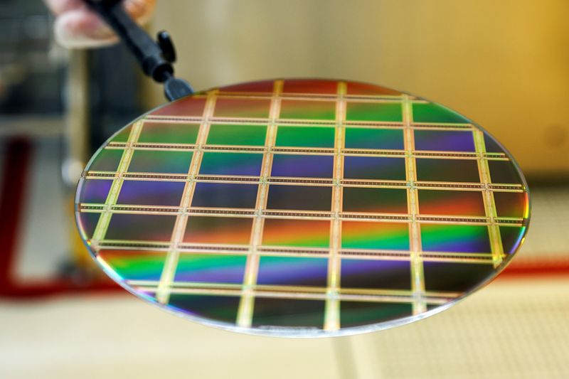A silicone semiconductor is seen at the offices of Israeli analog integrated circuits developer, Tower Semiconductor in Migdal HaEmek, northern Israel, February 28, 2022. REUTERS/Amir Cohen
