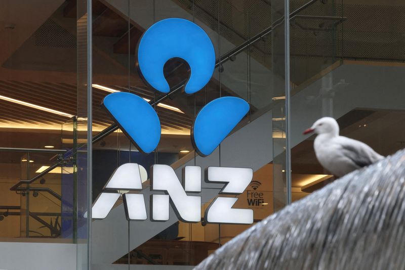FILE PHOTO: An Australia and New Zealand Banking Group Limited (ANZ) logo is displayed in a branch window in Sydney, Australia, September 9, 2025. REUTERS/Hollie Adams/File Photo