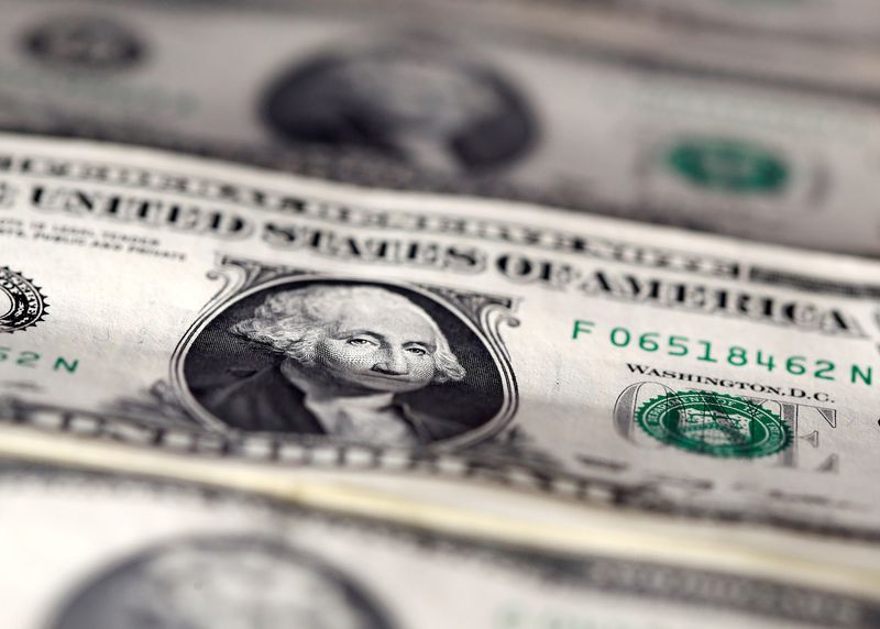 FILE PHOTO: U.S. dollar notes are seen in this November 7, 2016 picture illustration.   REUTERS/Dado Ruvic/Illustration/File Photo