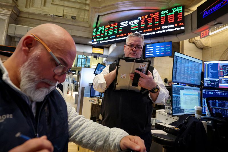 Traders work on the floor at the New York Stock Exchange (NYSE) in New York City, U.S., February 17, 2026.  REUTERS/Brendan McDermid