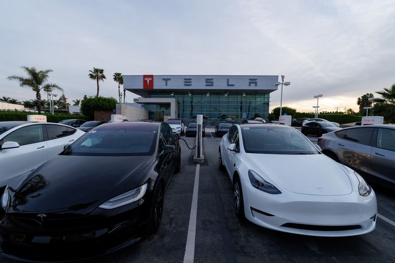 Tesla vehicles are show at a Tesla dealership in Buena Park, California, U.S., January 28, 2026. REUTERS/Mike Blake