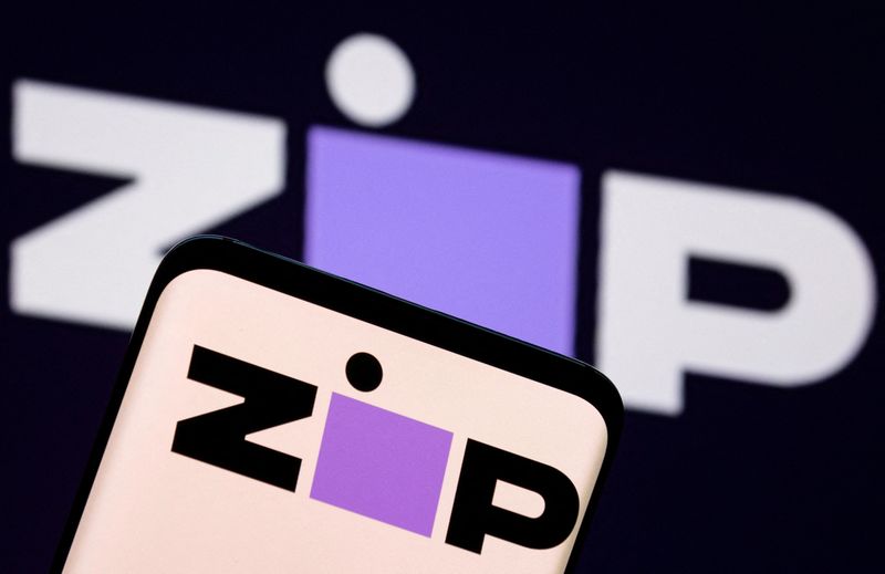 FILE PHOTO: Zip logo is seen on a smartphone in front of displayed same logo in this illustration taken January 25, 2022. REUTERS/Dado Ruvic/Illustration/File Photo
