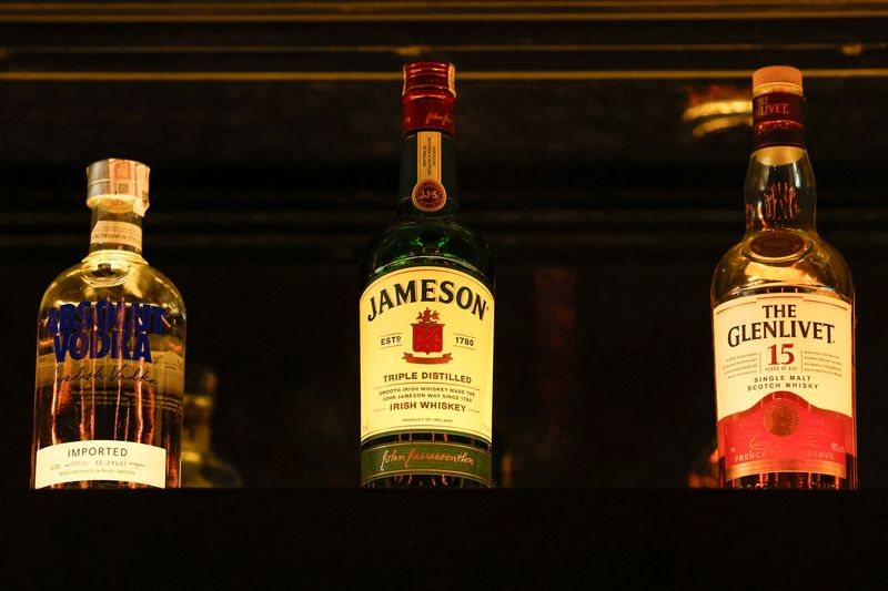 Bottles of Pernod Ricard's brands are displayed at a bar during a photo opportunity, in Gurugram, India, November 26, 2024. REUTERS/Priyanshu Singh