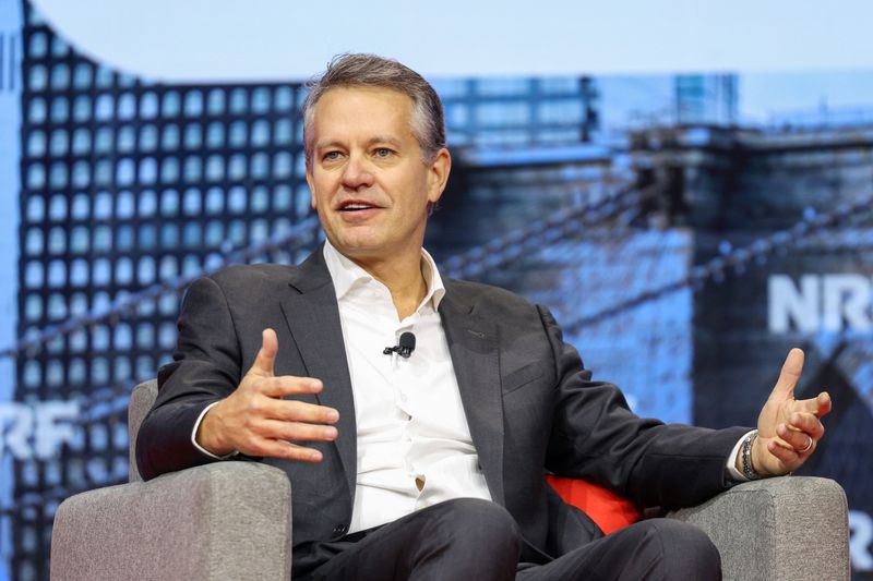 Walmart U.S. CEO and President John Furner speaks during a keynote session about how Walmart is implementing AI, during National Retail Federation (NRF) 2026: Retail's Big Show, in New York City, U.S., January 11, 2026. REUTERS/Kylie Cooper