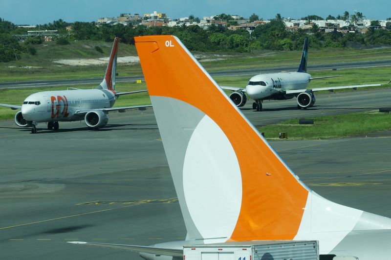 FILE PHOTO: Gol and Azul airlines planes are pictured at Luis Eduardo Magalhaes International Airport in Salvador, Brazil, February 3, 2025. REUTERS/Ueslei Marcelino/File Photo