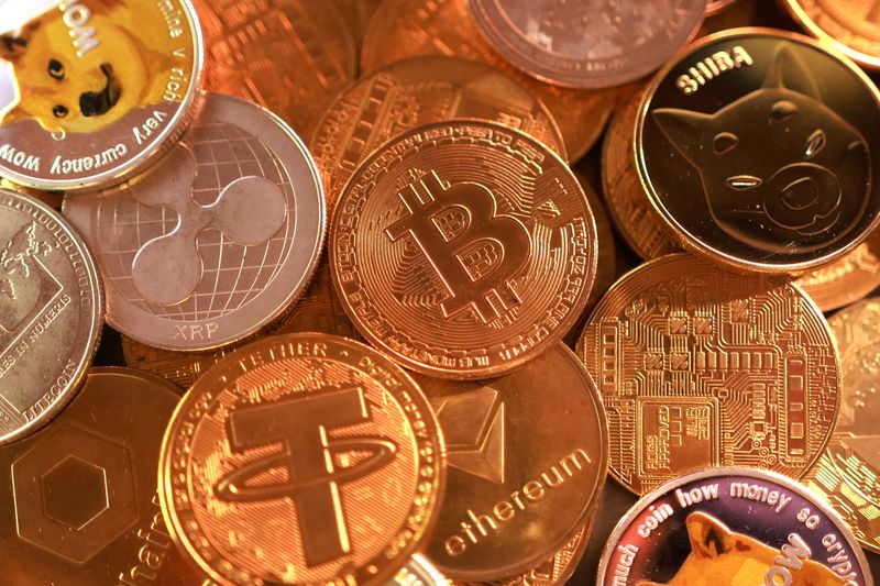 Representation of cryptocurrencies are seen in this illustration taken September 10, 2025. REUTERS/Dado Ruvic/Illustration