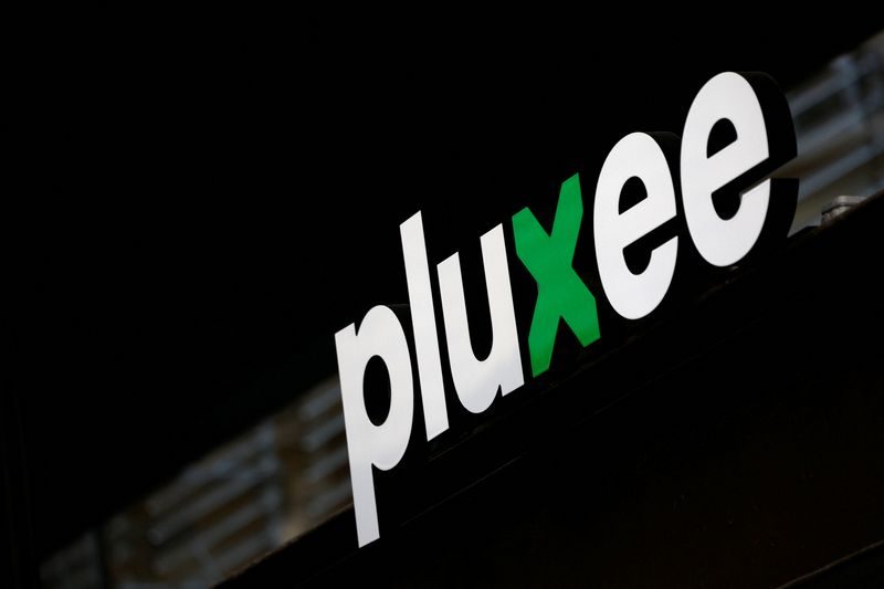 The logo of Pluxee, the voucher and benefits unit of French catering and food services group Sodexo, is seen at the company headquarters in Paris, France, February 5, 2024. REUTERS/Sarah Meyssonnier
